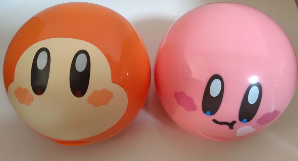 カービィとワドルディの顔が描かれた丸い容器